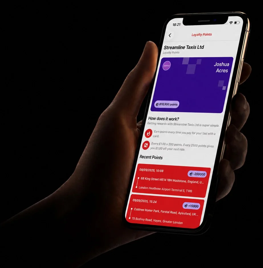 The Streamline app open on an iPhone, held in a hand, showing a customer's loyalty points balance and recent journeys