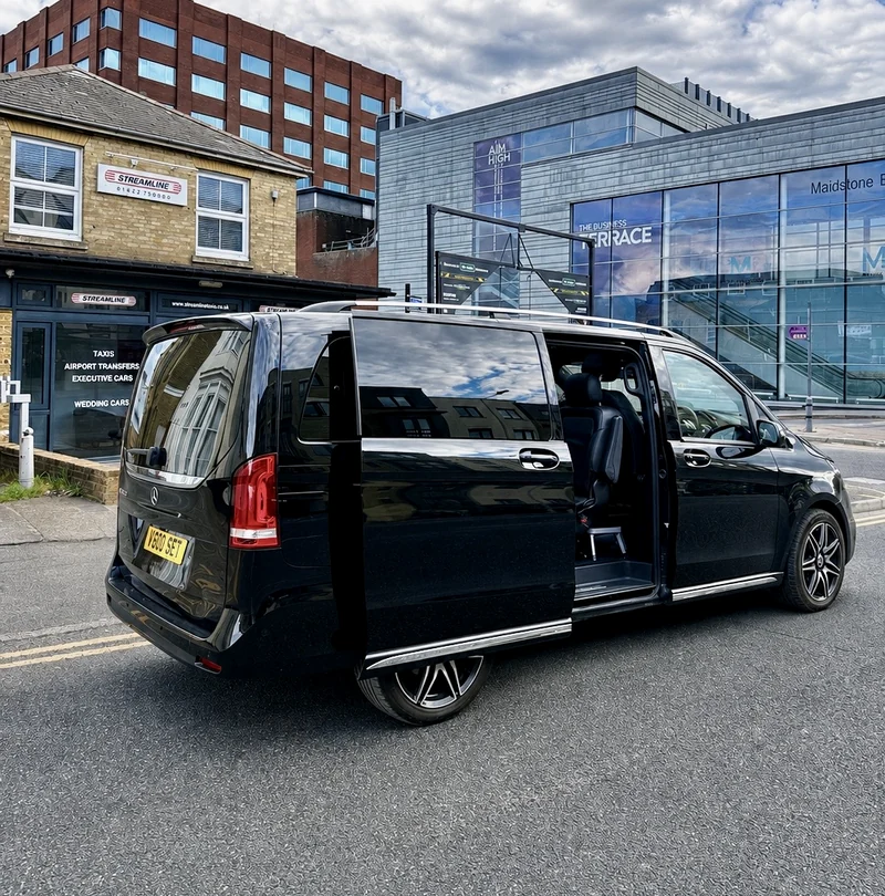 The Streamline Taxis office at 68 King Street, Maidstone, a Mercedes V-Class parked outside with its sliding door open