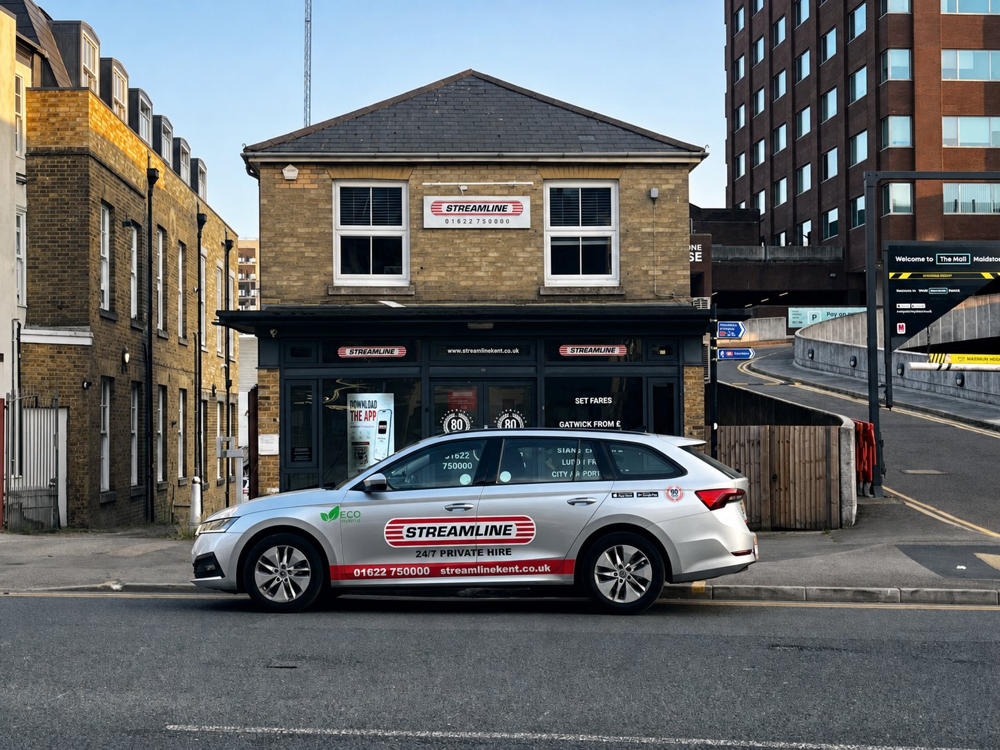 The Streamline Taxis office at 68 King Street, Maidstone, with a liveried Streamline estate car parked outside